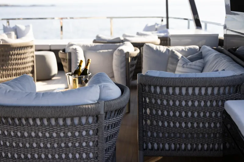 Slide: The Image of Control panel on the deck of 2025 Riva 130' Bellissima yacht, overlooking the water. - 26