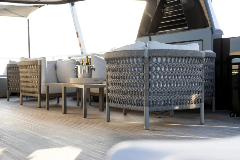 Slide: The Image of Luxurious deck of 2025 Riva 130' Bellissima yacht with city skyline view. - 27