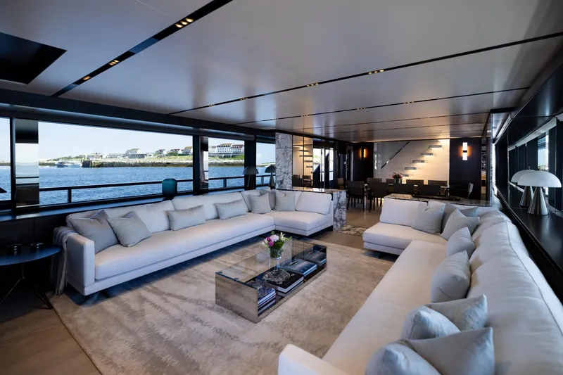 Slide: The Image of Luxurious 2025 Riva 130' Bellissima yacht with jacuzzi on deck, under clear blue sky. - 30