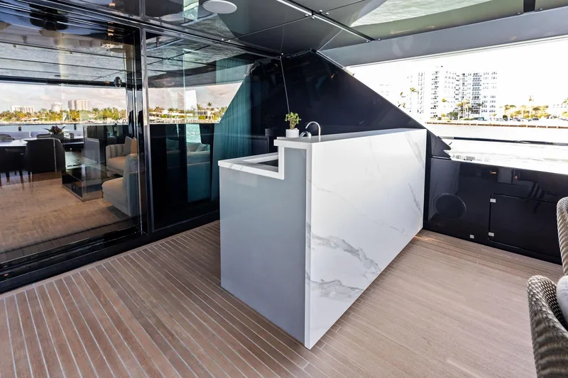 Slide: The Image of Luxurious interior of 2025 Riva 130' Bellissima yacht with sleek marble bar. - 42