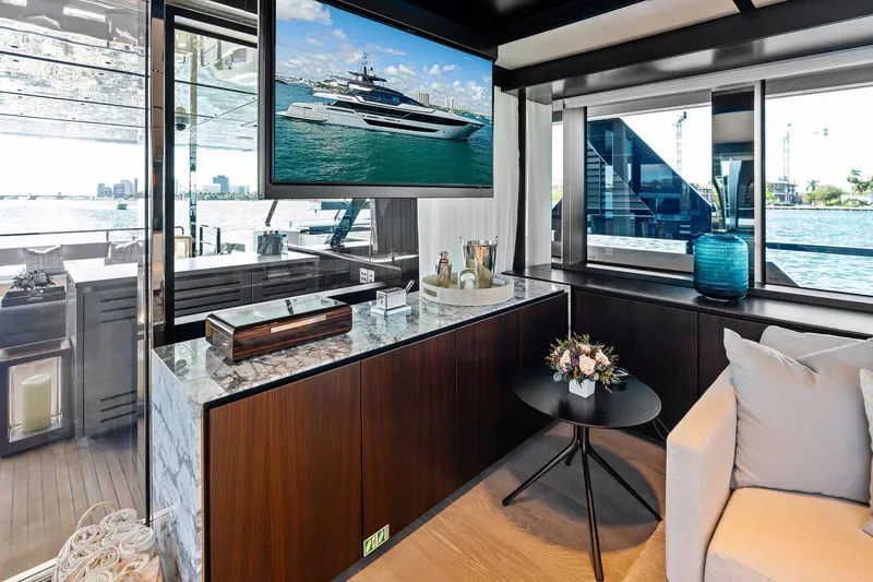 Slide: The Image of Luxurious interior of 2025 Riva 130' Bellissima yacht with elegant decor and waterfront view. - 57
