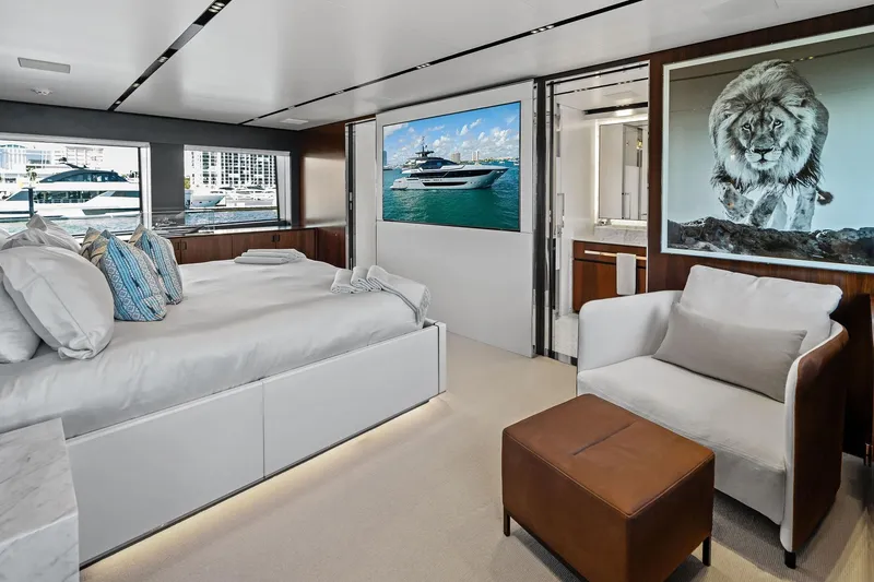Slide: The Image of Luxurious bedroom interior of 2025 Riva 130' Bellissima yacht with elegant decor and lion artwork. - 65