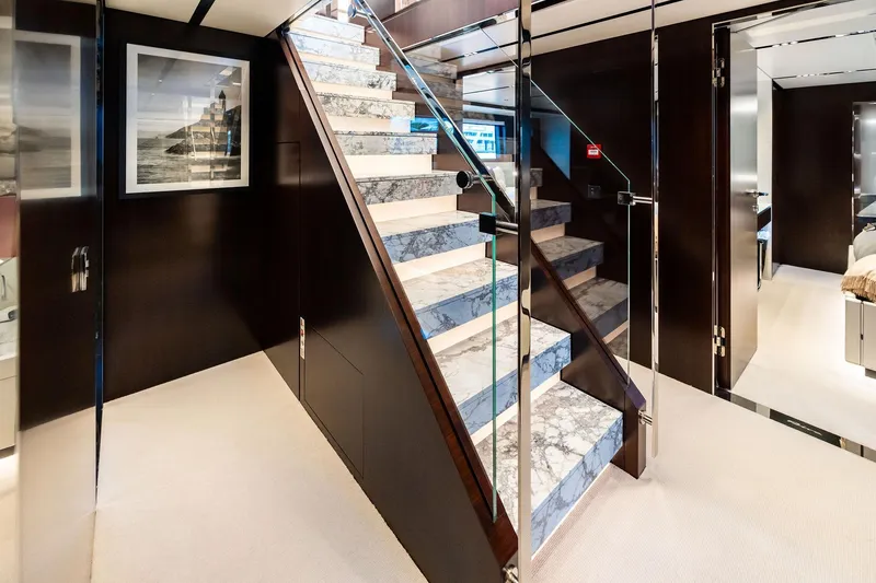 Slide: The Image of Luxurious interior of 2025 Riva 130' Bellissima yacht with elegant marble staircase. - 71