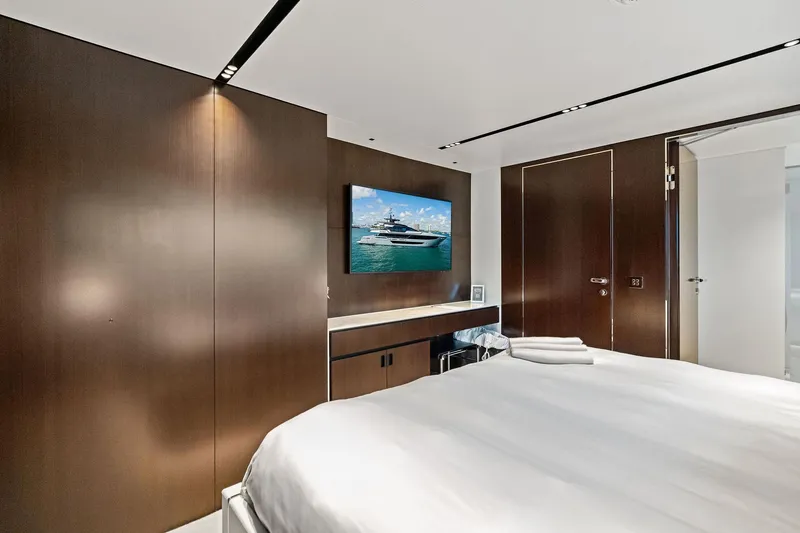 Slide: The Image of Luxurious bedroom interior on 2025 Riva 130' Bellissima yacht with modern decor. - 76