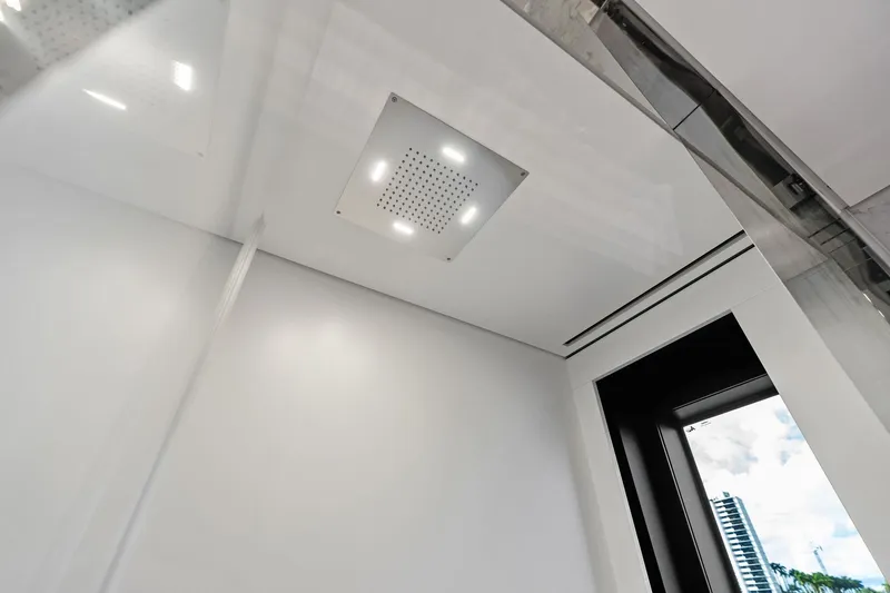 Slide: The Image of Ceiling view of Riva 130' Bellissima yacht interior, featuring modern lighting, 2025 model. - 78