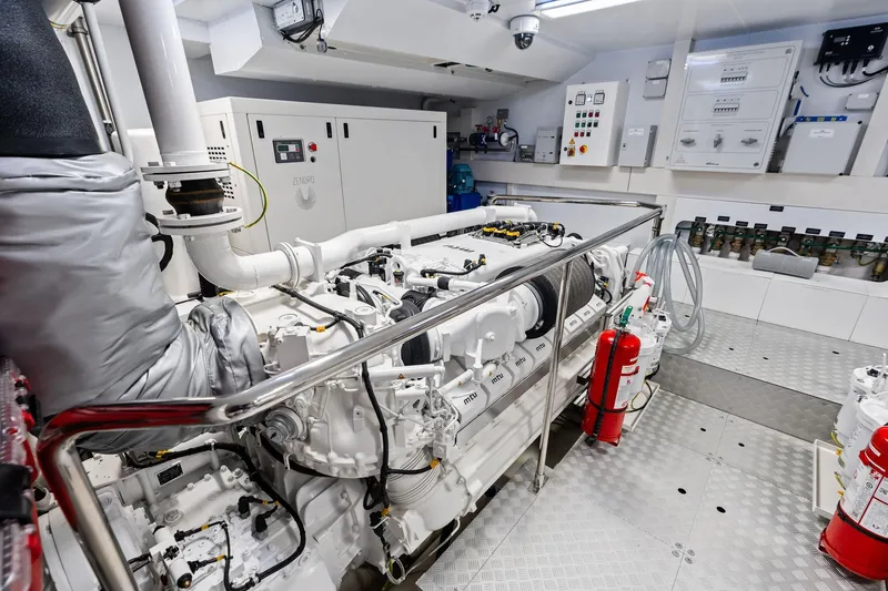 Slide: The Image of Engine room of 2025 Riva 130' Bellissima yacht, featuring advanced machinery and safety equipment. - 88