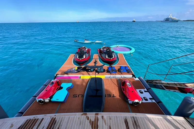 Slide: The Image of Aerial view of 2025 Riva 130' Bellissima yacht on clear blue water. - 9