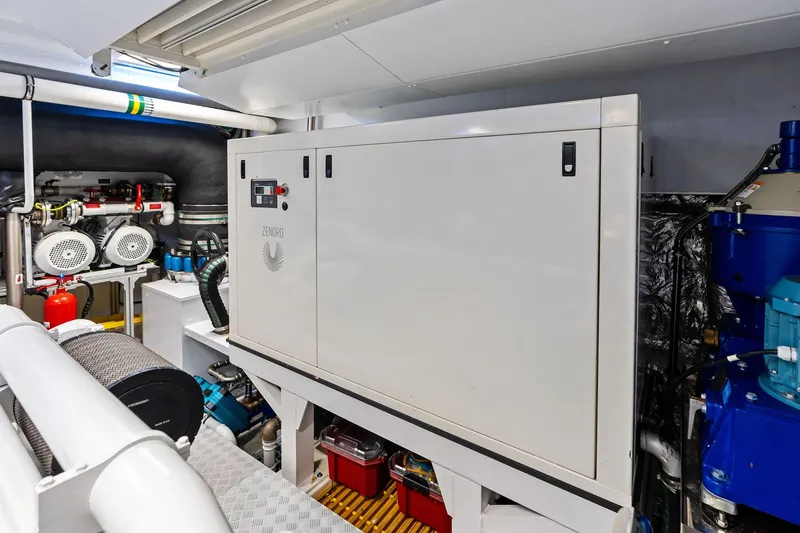 Slide: The Image of Engine room of 2025 Riva 130' Bellissima yacht, featuring advanced machinery and equipment. - 96