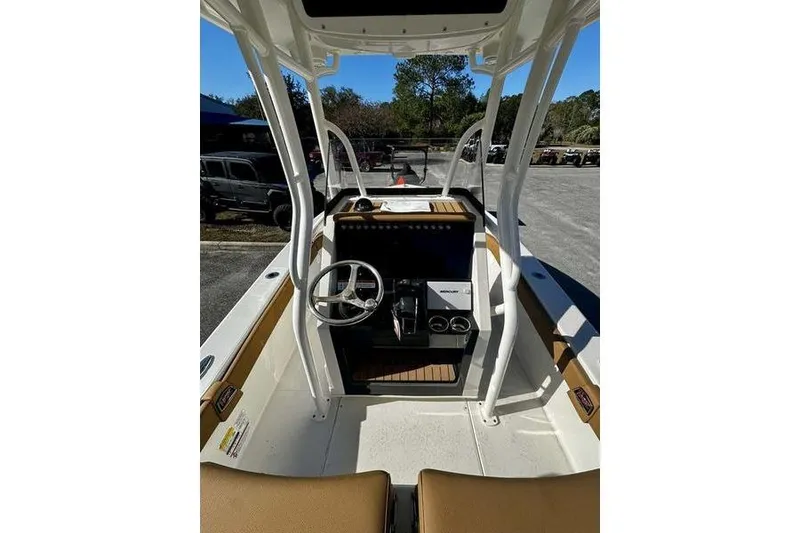 Slide: The Image of 2026 Ranger 2600 Bay boat interior with steering wheel and console. - 10