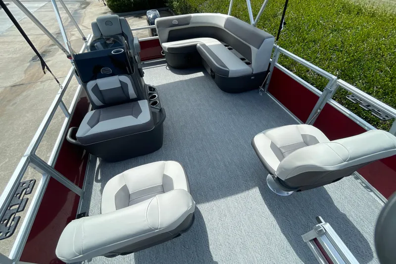 Slide: The Image of 2026 Sun Tracker Bass Buggy 16 XL Select pontoon boat interior with spacious seating and modern design. - 8