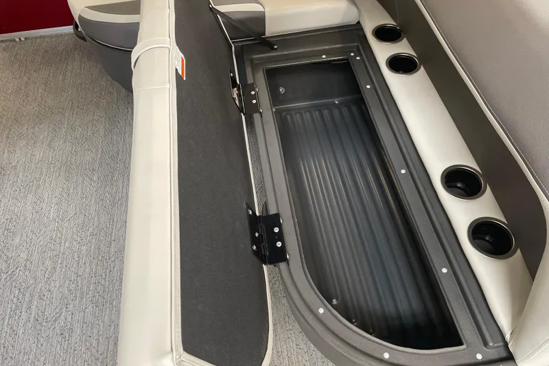 Slide: The Image of 2026 Sun Tracker Bass Buggy 16 XL Select boat seat storage with cup holders. - 12