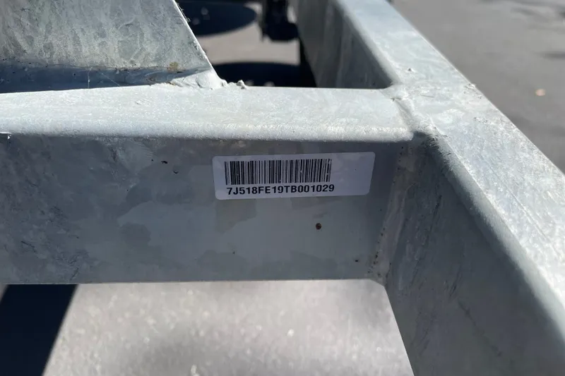 Slide: The Image of Barcode on metal frame of 2026 Mako Pro Skiff 13 CC boat trailer. - 55