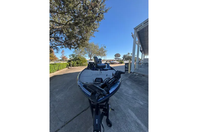 Slide: The Image of 2026 Nitro Z18 Pro boat parked outdoors under clear blue sky. - 3