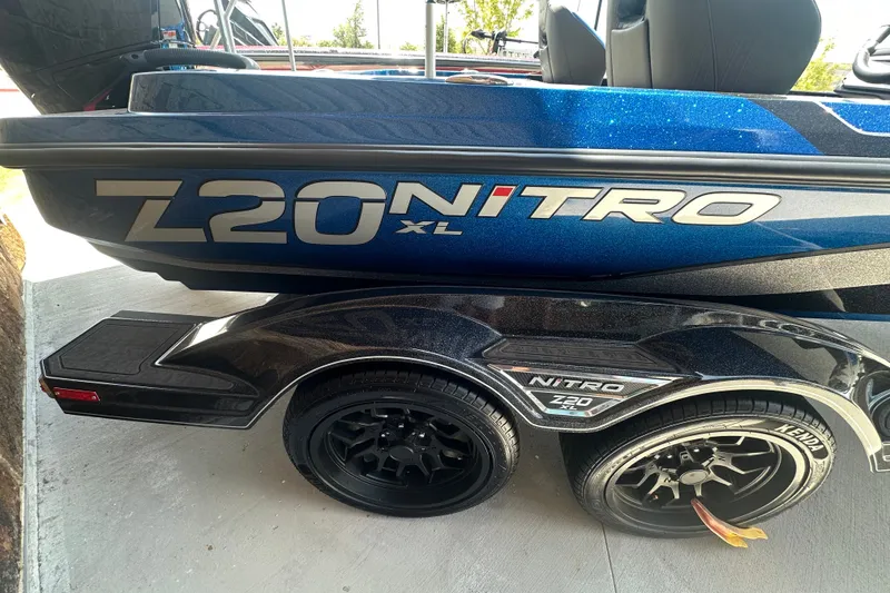 Slide: The Image of 2026 Nitro Z20 XL Pro boat with sleek design and custom wheels. - 4