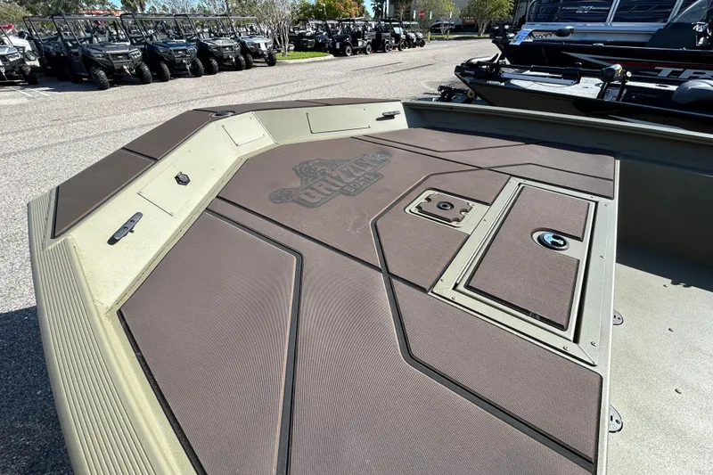 Slide: The Image of 2026 Tracker Grizzly 1860 CC boat deck, featuring storage compartments and sleek design. - 3