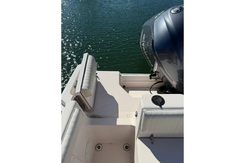 Slide: The Image of 1998 Grady-White Advance 247 boat with Yamaha outboard engine on water. - 14