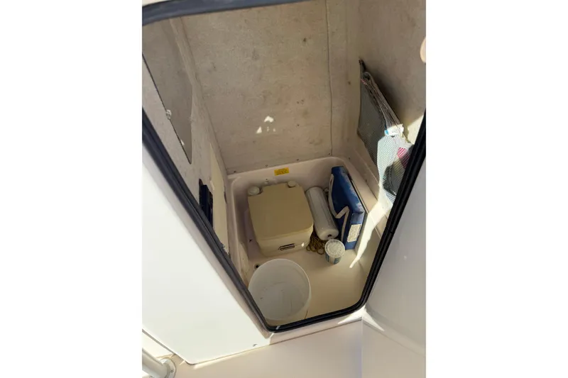 Slide: The Image of Interior storage compartment of 1998 Grady-White Advance 247 boat. - 7