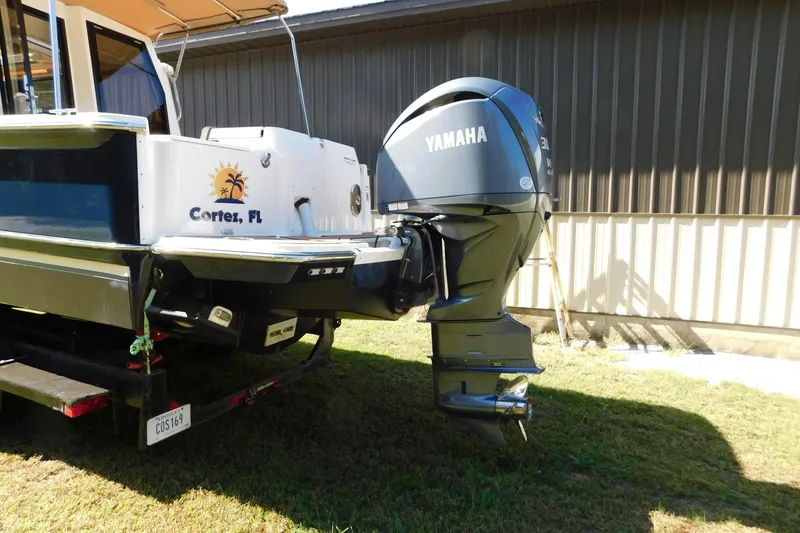Slide: The Image of 2022 Ranger Tugs R-27 with Yamaha outboard motor, parked in Cortez, FL. - 52