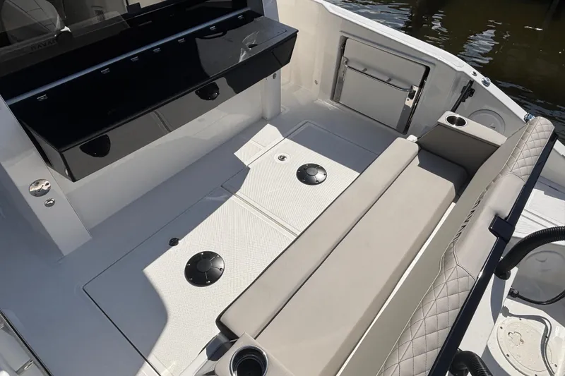Slide: The Image of Interior of 2026 Navan C30 boat featuring seating and storage compartments. - 12