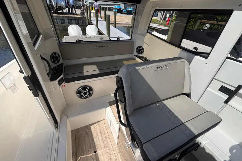 Slide: The Image of Interior of 2026 Navan C30 boat with seating and modern design features. - 16