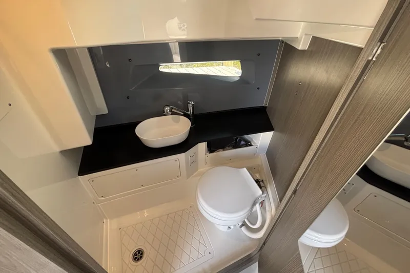 Slide: The Image of Compact bathroom in 2026 Navan C30 with modern sink and toilet design. - 20