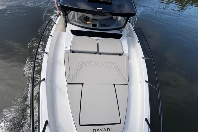 Slide: The Image of 2026 Navan C30 boat cruising on water, featuring sleek design and comfortable seating. - 8