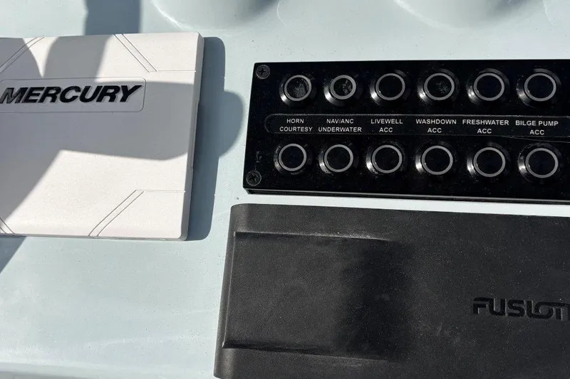 Slide: The Image of Control panel of 2026 Tidewater 2500 Carolina Bay boat with Mercury and Fusion components. - 20