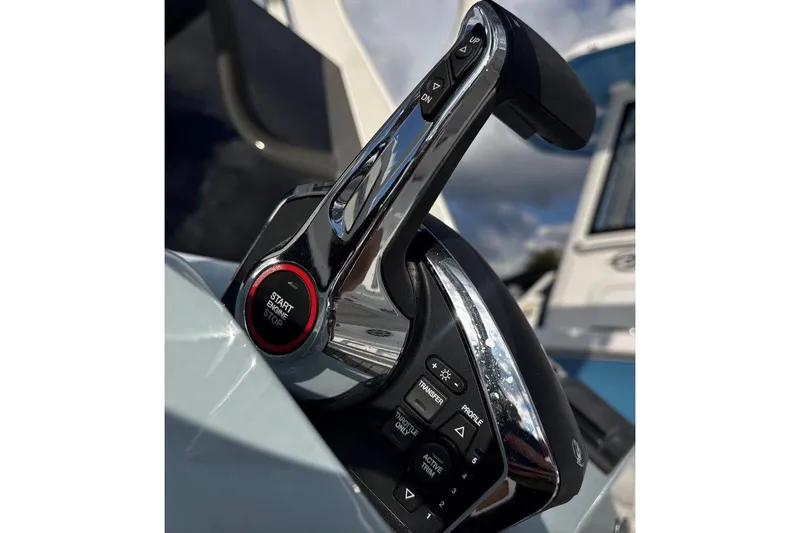 Slide: The Image of Close-up of 2026 Tidewater 2500 Carolina Bay boat throttle controls. - 22