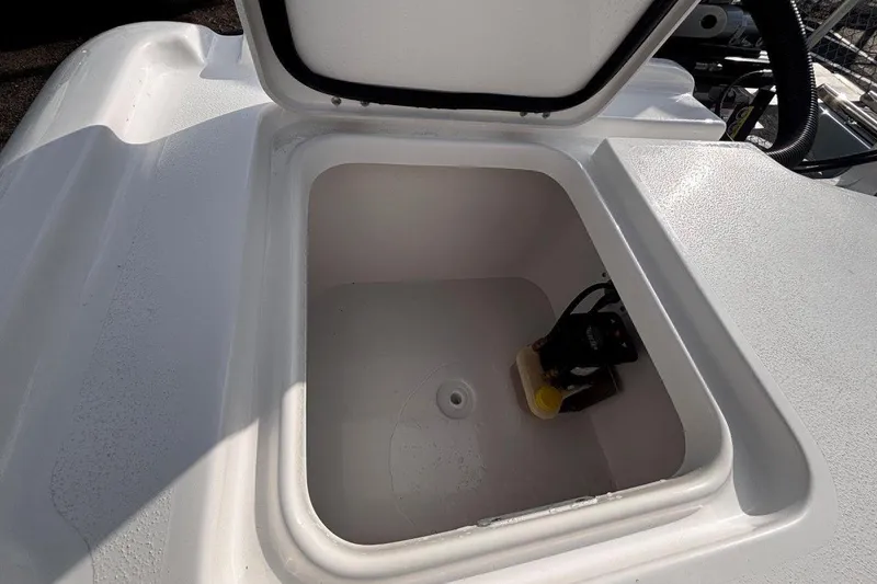 Slide: The Image of Open storage compartment on 2026 Tidewater 2500 Carolina Bay boat. - 31