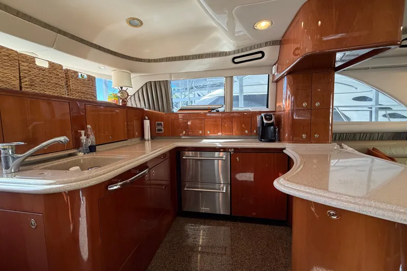 Slide: The Image of Luxurious kitchen interior of 2003 Sea Ray 560 Sedan Bridge yacht. - 14