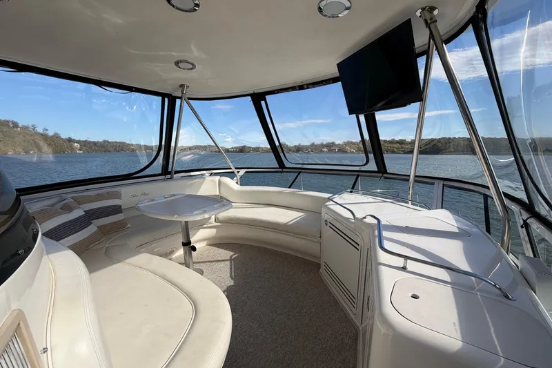 Slide: The Image of Luxurious 2003 Sea Ray 560 Sedan Bridge interior with panoramic water views. - 3