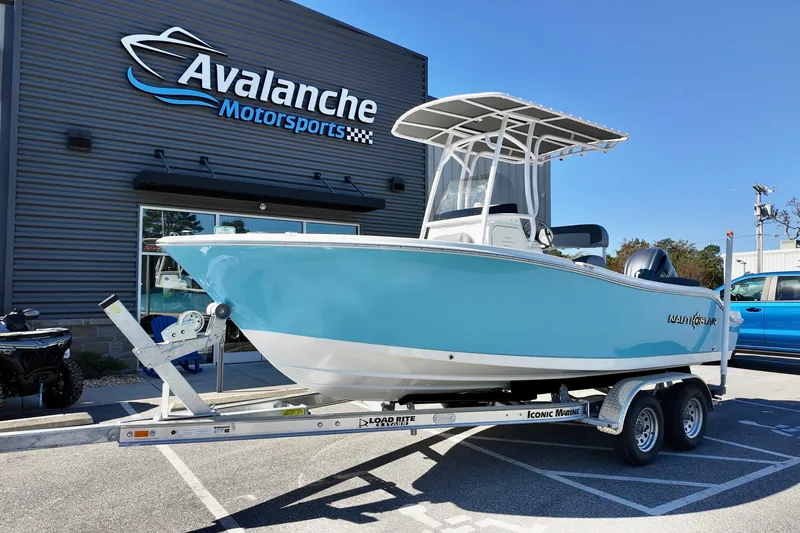 The Image of 2025 NauticStar 212 Legacy boat on trailer at Avalanche Motorsports. - 3