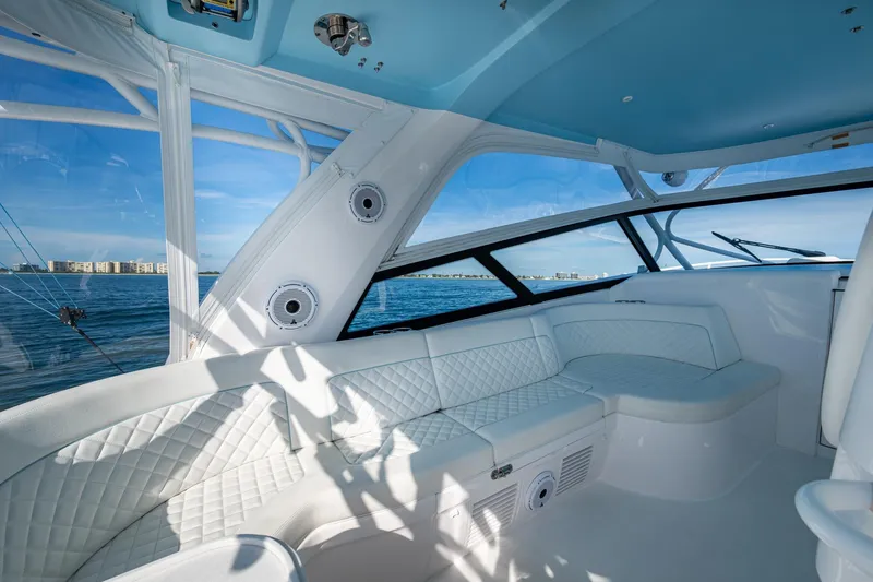 Slide: The Image of Luxurious interior of 2023 Intrepid 477 Evolution yacht with ocean view. - 65