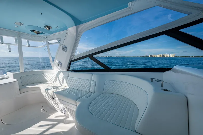 Slide: The Image of Luxurious interior of 2023 Intrepid 477 Evolution yacht with ocean view. - 66