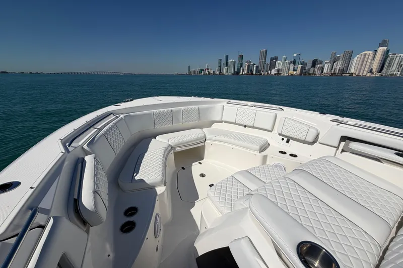 Slide: The Image of Luxurious 2021 Pursuit S 378 Sport boat interior with city skyline view. - 12