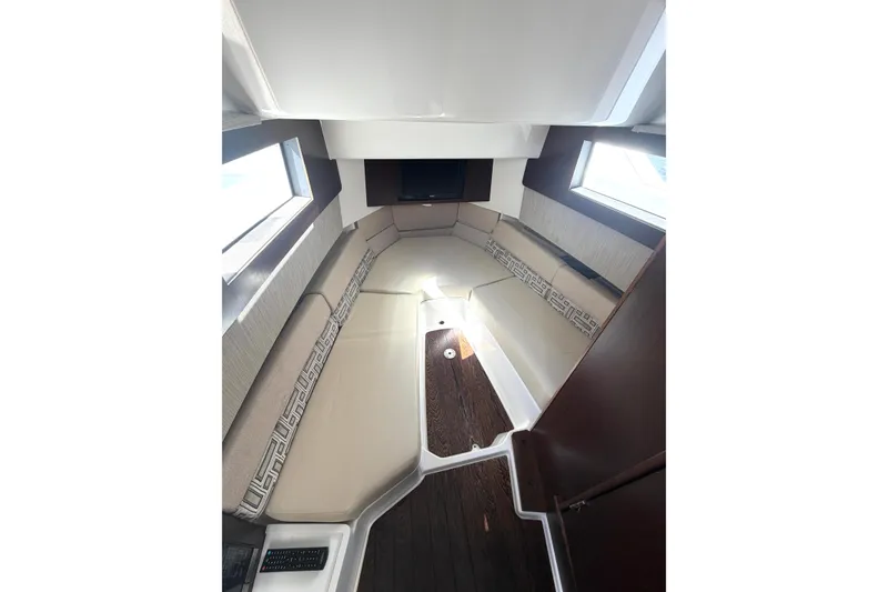 Slide: The Image of Interior of 2021 Pursuit S 378 Sport boat with elegant seating and modern design. - 17