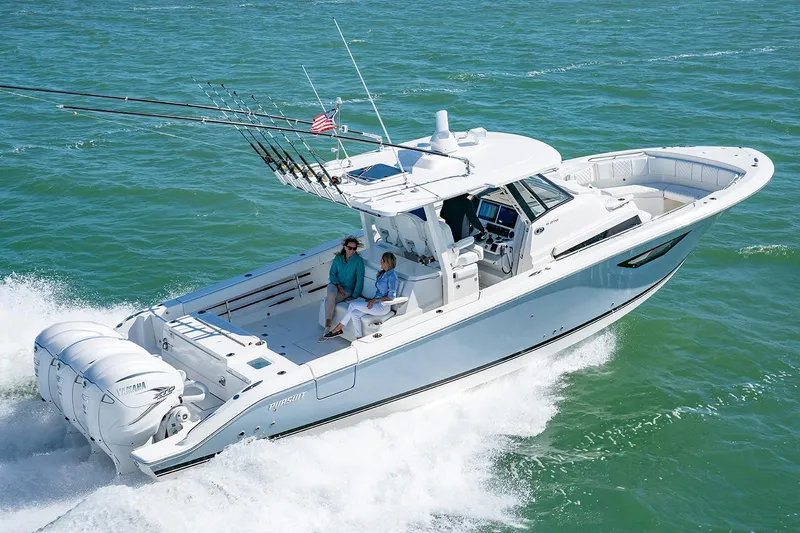 Slide: The Image of Manufacturer Provided Image: 2021 Pursuit S 378 Sport boat cruising on the ocean. - 3