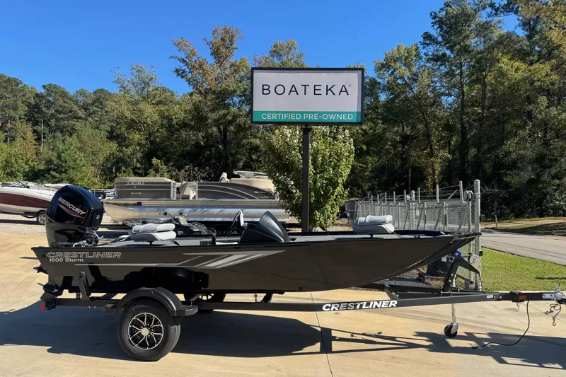 The Image of 2026 Crestliner 1600 Storm boat at Boateka, certified pre-owned, parked outdoors. - 0