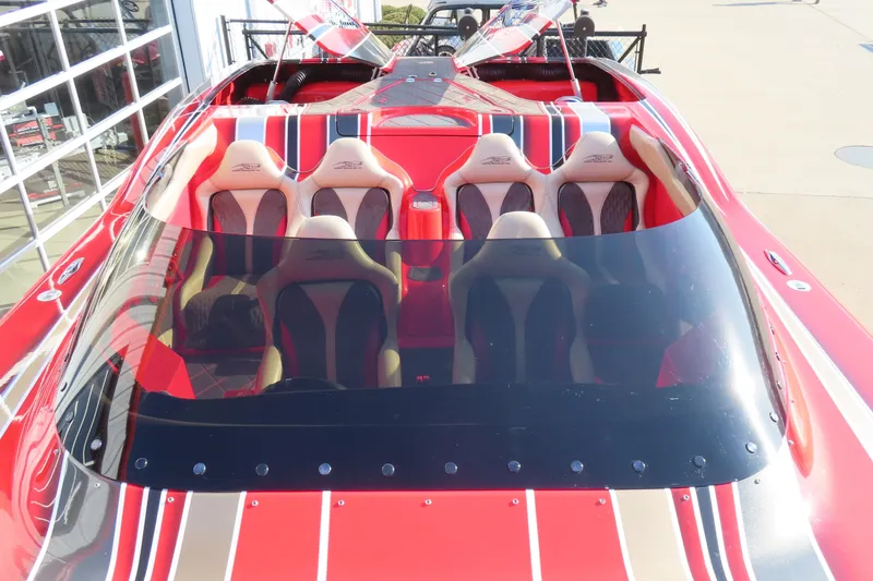 Slide: The Image of Red 2010 MTI 36 R/P speedboat with sleek design and sporty seating. - 23