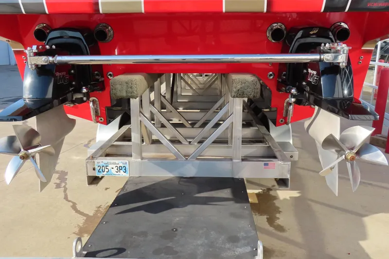 Slide: The Image of Rear view of a 2010 MTI 36 R/P boat with dual propellers and Oklahoma license plate. - 4