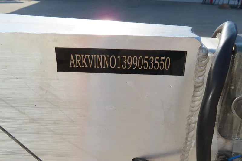Slide: The Image of VIN plate on 2010 MTI 36 R/P boat, displaying ARKVINNO1399053550. - 7