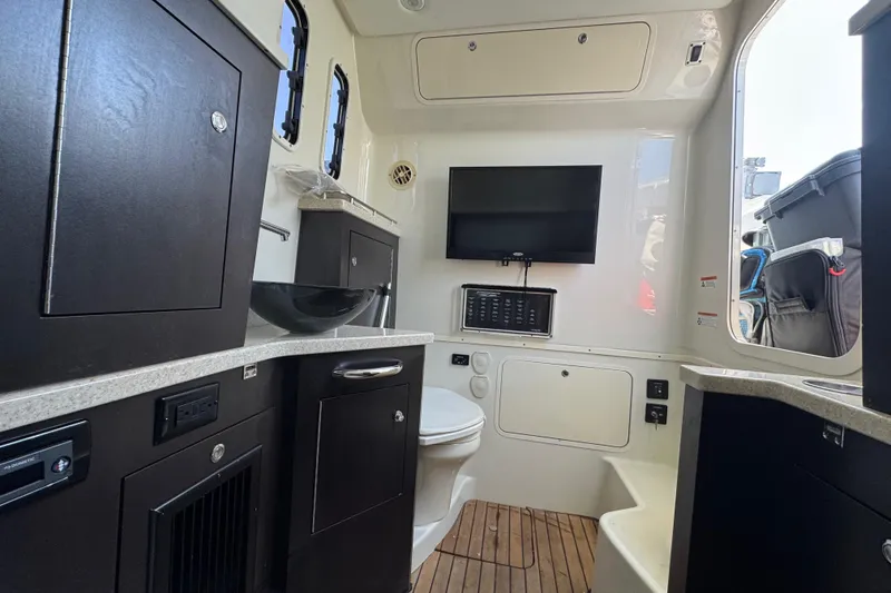 Slide: The Image of 2017 HCB 42 Siesta cabin interior with modern amenities and sleek design. - 27