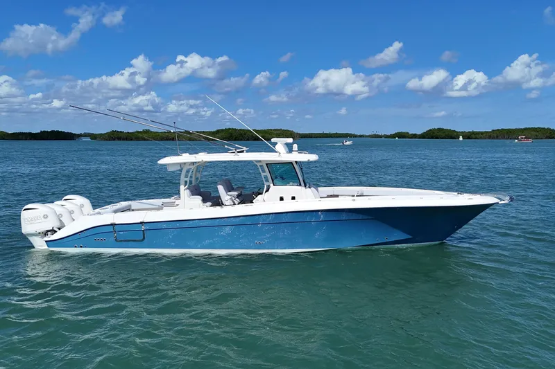 Slide: The Image of 2017 HCB 42 Siesta boat on blue water under clear sky. - 9