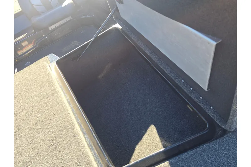 Slide: The Image of Open storage compartment in 2018 Nitro Z17 boat interior. - 12