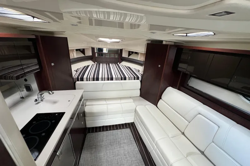 Slide: The Image of Luxurious interior of 2014 Monterey 320 Sport Yacht with modern amenities and elegant design. - 10