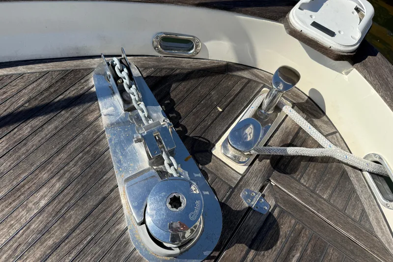 Slide: The Image of Deck of 2013 Greenline 33 yacht with anchor chain and cleat. - 12