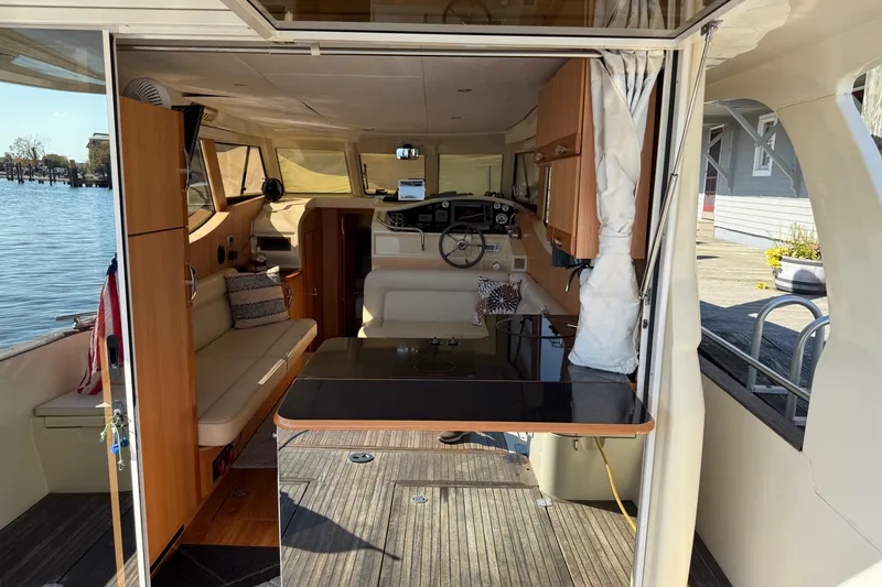 Slide: The Image of Interior view of 2013 Greenline 33 yacht, featuring modern design and comfortable seating. - 20