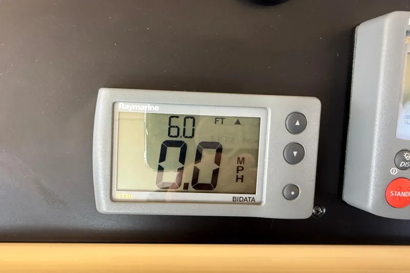 Slide: The Image of Raymarine ST40 display on 2013 Greenline 33, showing 6.0 feet depth, 0.0 MPH speed. - 46