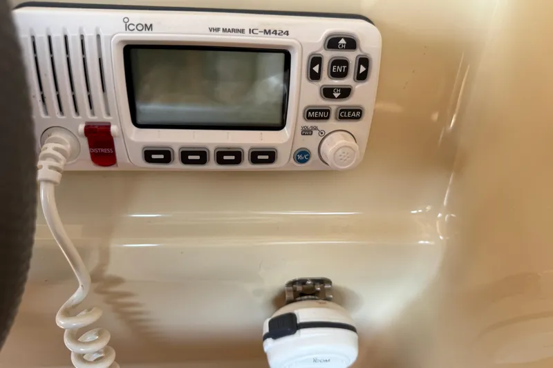 Slide: The Image of VHF marine radio on 2013 Greenline 33 boat dashboard. - 55