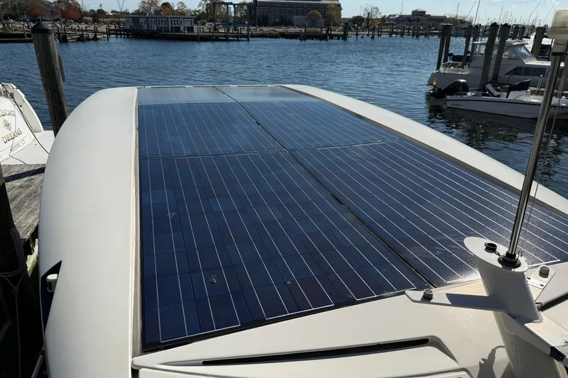 Slide: The Image of Solar panels on 2013 Greenline 33 boat docked at marina. - 8